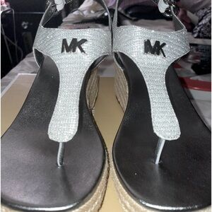 Size 8.5 Michael kore wedge sandals.never been worn